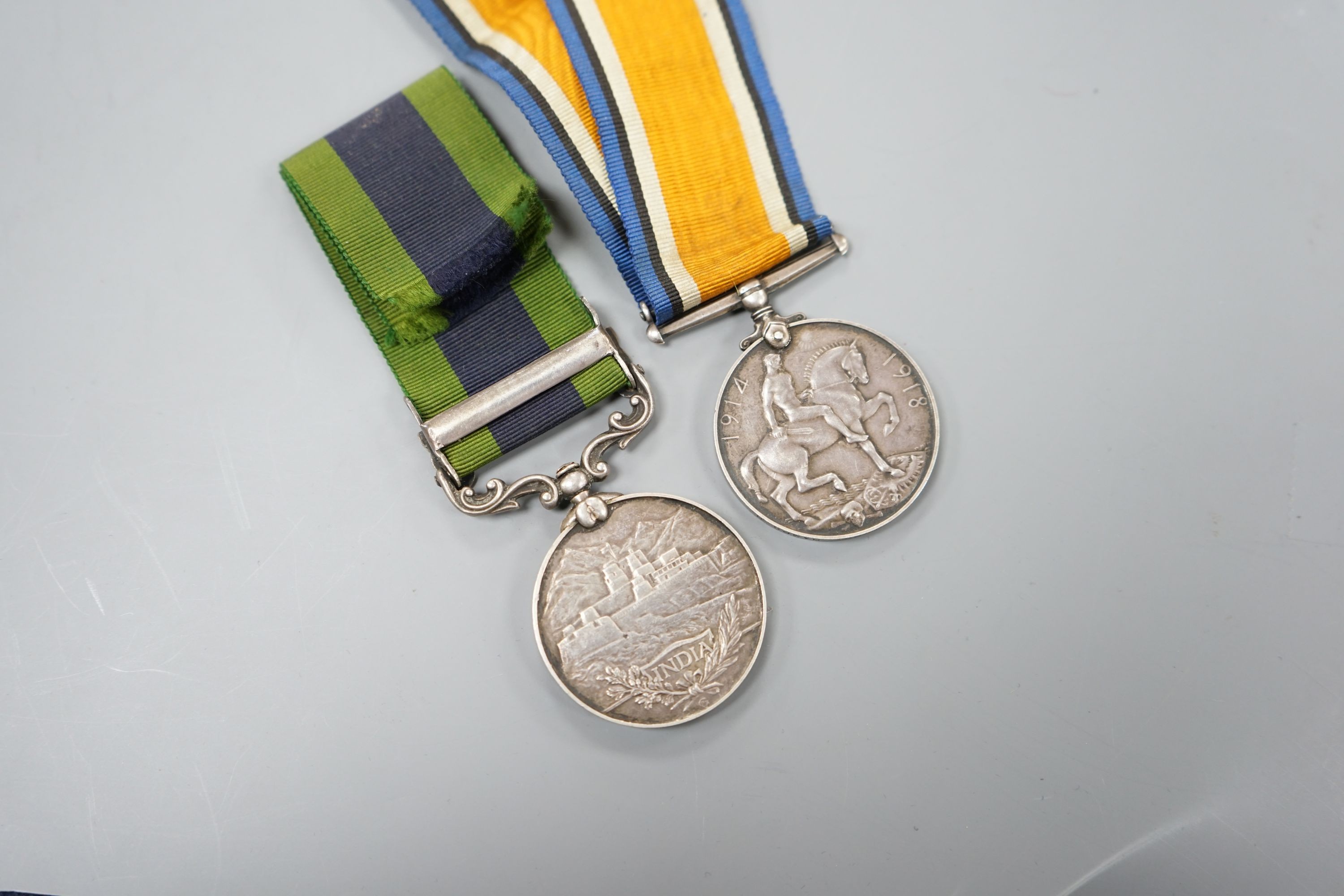 A George V IGSM with Afghanistan N.W.F. 1919 clasp and WW1 war medal to 1914 PTE. J. G. GIBBS HAMPS. R.